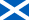 Flag of Scotland featuring a white saltire cross on a blue field.